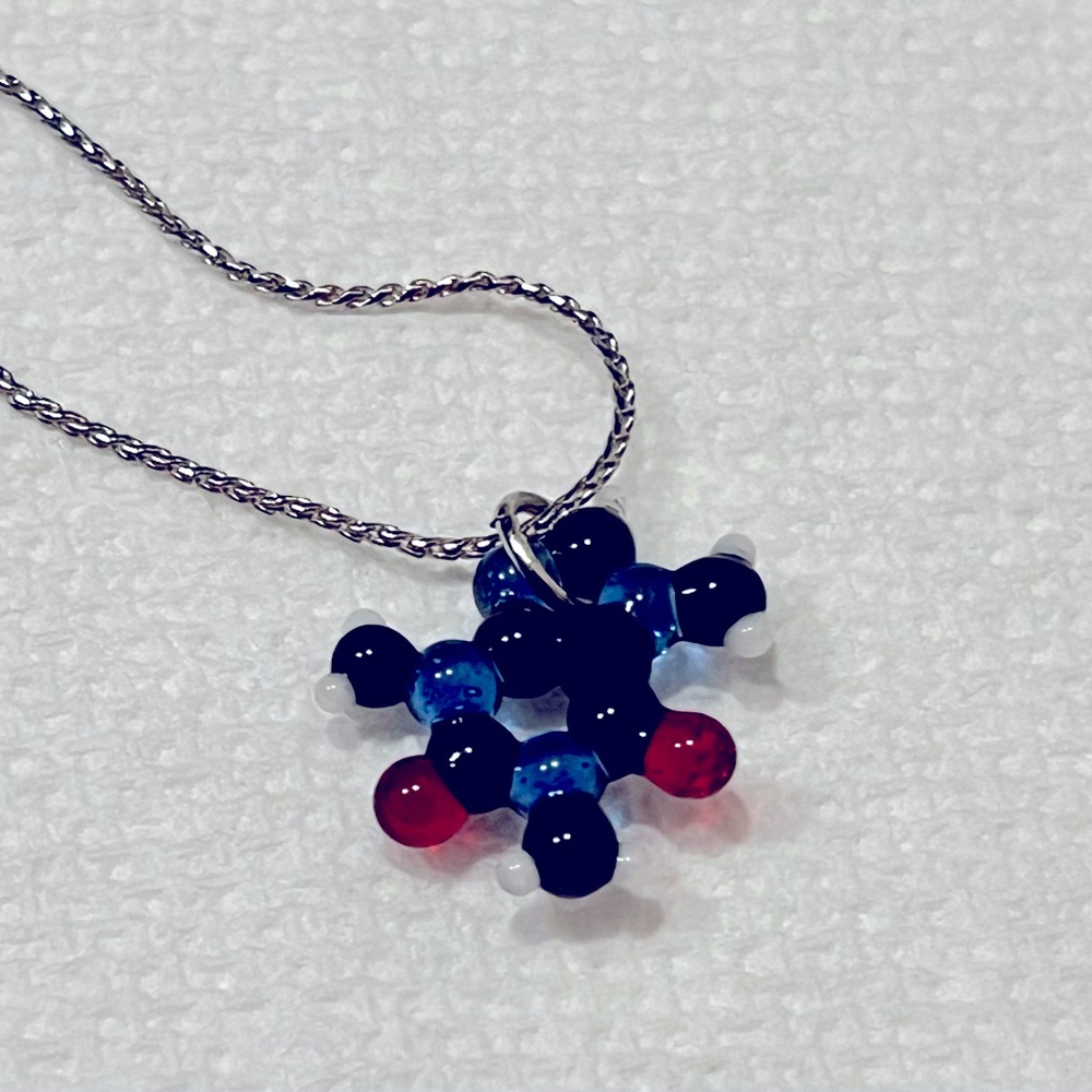 Unique necklace with caffeine pedant